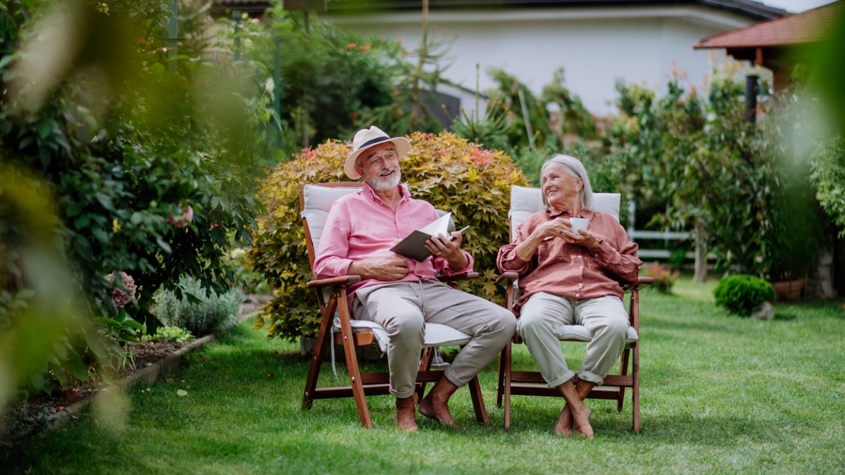 detroit lawn care backyard couple relaxing 